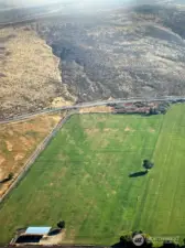 Aerial view from Bare Road, looking east.  Tree in the middle is roughly the property line.  The canal is behind.