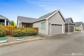 The home features a spacious 2-car garage with extra depth, offering ample room not only for vehicles but also for storage, a workbench, or hobby space. Whether you need space for outdoor gear, tools, or simply extra room to move around, this oversized garage delivers versatility and convenience.