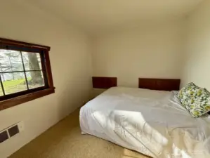 Primary bedroom in cabin.