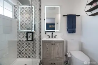 Updated primary bath w/ anti-fog mirror.