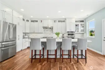 Fully remodeled in 2019! White cabinets, white Quartz counters, tile backsplash, gas cooking and stainless steel appliances.