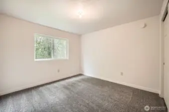 Second bedroom downstairs, for a total of four in the house.