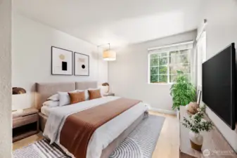 Bedroom #2 offers flexibility—ideal as a cozy bedroom or a serene home office with views of the creek