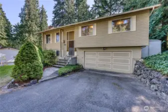 Deep driveway with plenty of parking.