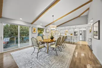 Fantastic dining space and kitchen with vaulted ceilings, sparkling wood floors and all new lighting. Heated kitchen floors.