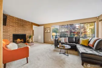 We have moved to lower level. Cozy family/TV room with wood burning fireplace.
