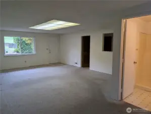 Large Rec room. This has been used as a primary or 4th bedroom with the 3/4 bath attached. #2111 5th St SW, Puyllup, WA 98371