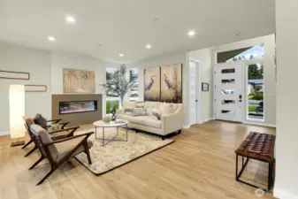 Spacious great room with electric fireplace, where you're met with a harmonious blend of style and function.