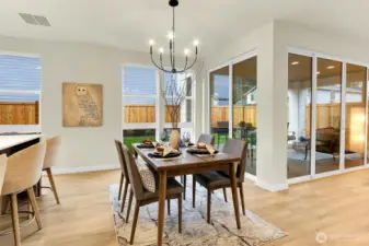 Bathed in natural light and just steps from the kitchen, the dining room is the heart of every celebration.