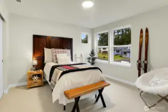 Spacious and filled with natural light, the secondary bedrooms offer comfort and flexibility.