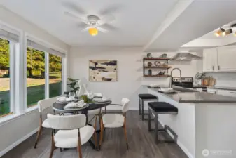 Updated kitchen great for entertaining or peaceful bird watching from your expansive windows.