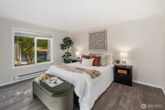 Open primary suite with walk in closet.