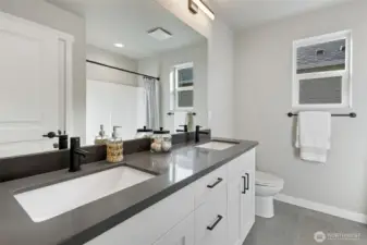 Photos are of another home in the community and are for illustration purposes only to reflect typical finishes.  May depict seller enhancements.  Colors and options may vary.