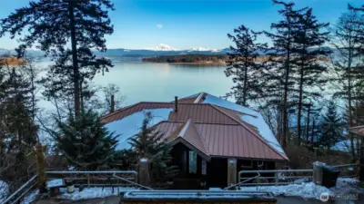 Welcome to 1822 Seacrest Drive! This custom built home is situated along the salt water shoreline of Lummi Island, looking directly at the City of Bellingham with majestic Mt Baker behind.