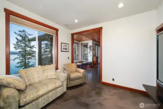 The living room is just off the kitchen and breakfast nook area, and open to the other spaces, but with the same stunning views!