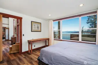 The bedroom on the lower level also has the stunning views and is a few steps from the hot tub!