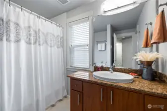 Full bath with privacy window.