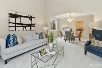 The living room and dining room flow nicely together.