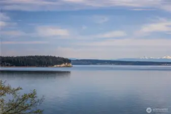 Enjoy stunning 180 degree views from this home of Marrowstone Is., Admiralty Inlet & the Cascade Mt. Range.