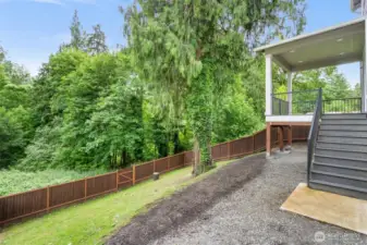 backyard from bottom of deck stairs
