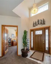 The formal entry with skylight & chandelier adds charm.