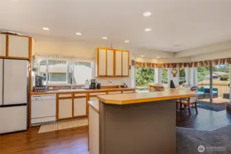 Well appointed kitchen has room for more than one chef & great cabinets.