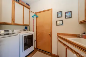 The laundry room is off the kitchen with garage access.
