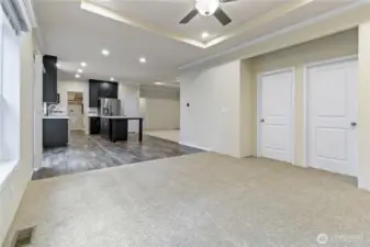 Fam room looking back to kitchen/ 2 bedrooms on right