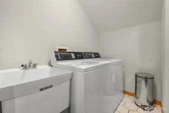 Utility room with heated tile floors