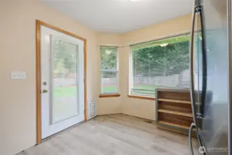 Eating nook leads to patio.