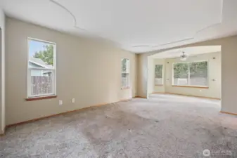 Great primary bedroom suite with sitting area.