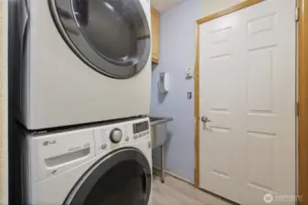 Utility room with wash sink.