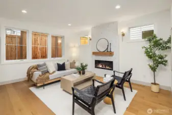 Cozy living area with fireplace and custom tile surround
