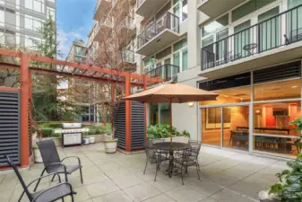 Garden terrace offers space to grill and lounge