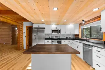 Center island with seating for two — perfect for morning coffee or casual meals.