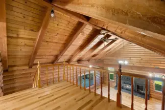 A loft overlooking the great room offers the perfect reading nook or office space.