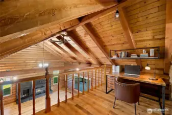 Loft virtually staged as office space to showcase work-from-home or home office potential.