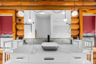 The new sink and faucet and backsplash serve as the focal point of the upstairs bath.