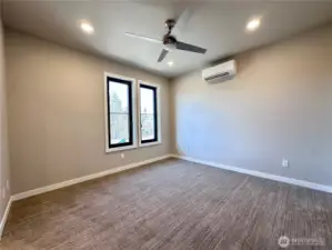Primary Bedroom with ceiling fan and attached en suite