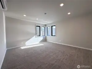 Flex space perfect for media room, office and additional guest space and looks out to native green space.