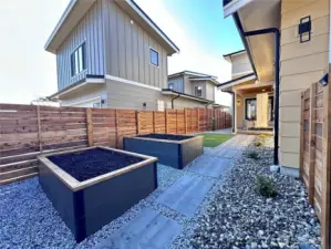 Two raised bed planters for vegetables or flowers.