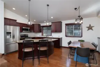 Open kitchen with eating counter eating space