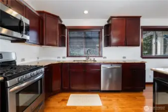 Minimal, clean kitchen space -- ready for you to move on in!