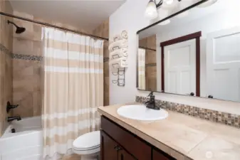 Full bath located on upper level of the home