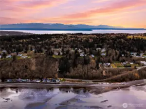 Nestled between the Cascades + Olympic mountains -- this home sits in an easily commutable neighborhood on Whidbey Island
