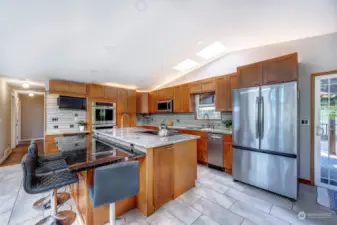Granite counters, induction cooktop, goose neck faucets!
