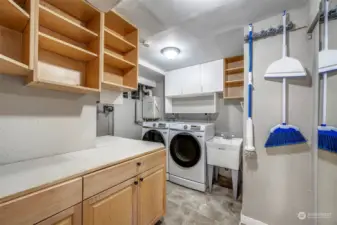 Utility room complete with washer/dryer. Also tankless water heater.