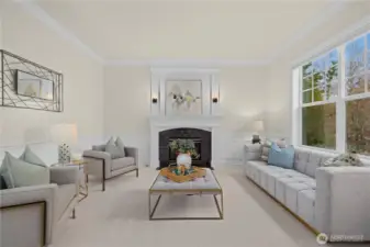 Great room with a fireplace off the front door.