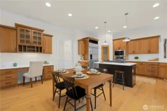 Open kitchen and informal dining area. Recently upgraded. New painting and lighting.