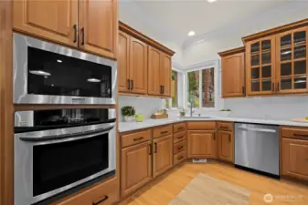 Stainless steel appliance package in the kitchen. Brand new microwave.